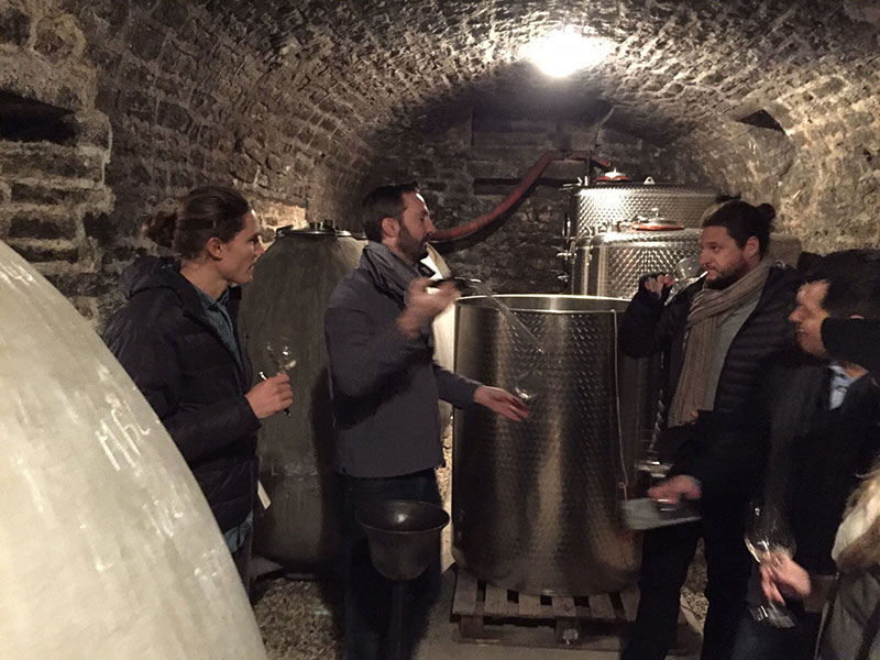 Seth at a Dujac wine cave with the Seysses family